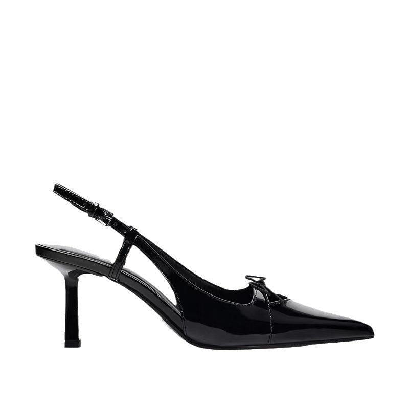 Patent leather bow with pointed tip thin heel and a shallow strap sandals