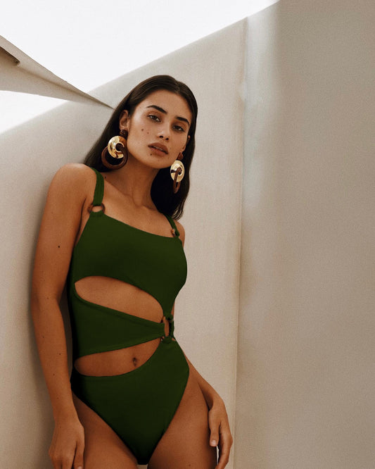 One piece swimsuit with tight fitting solid color bikini