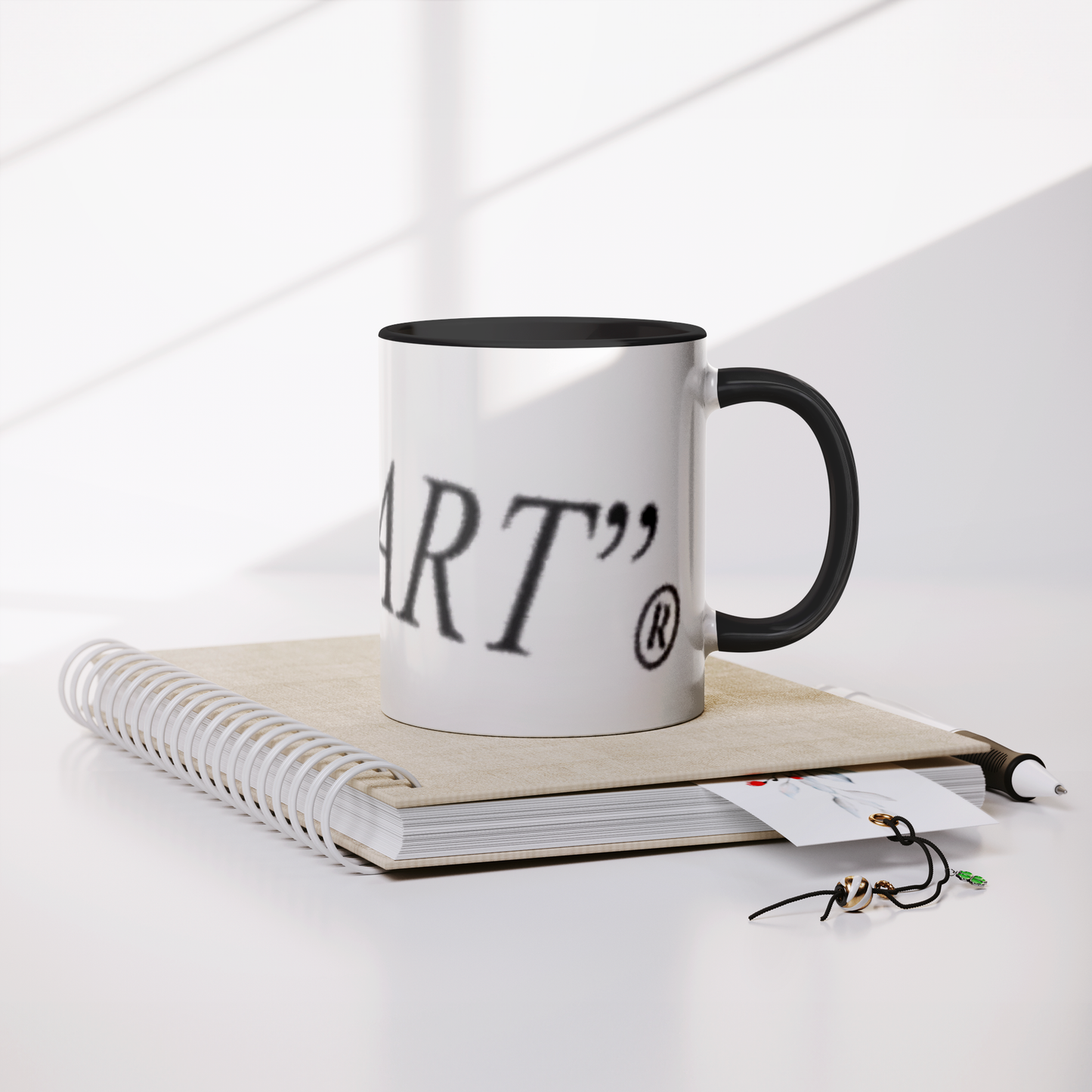 THAT_PART_branded_11oz_Coffee_Mug_Mug_Lifestyle_Notebook_Mockup.png